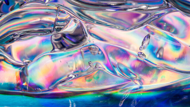Iridescent melting ice texture with rainbow reflections