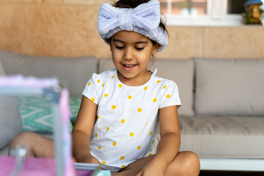 Girl Smiling During Pretend Makeover