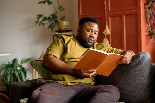 Reading a book journal at home