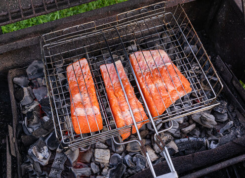 Salmon fillet cook over charcoal barbecue grill