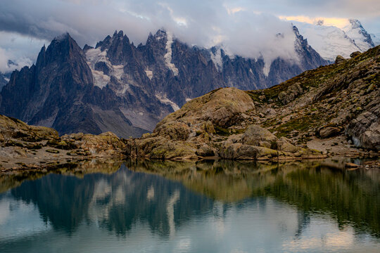 Aiguilles Rouges mountain reflection in alpine lake
