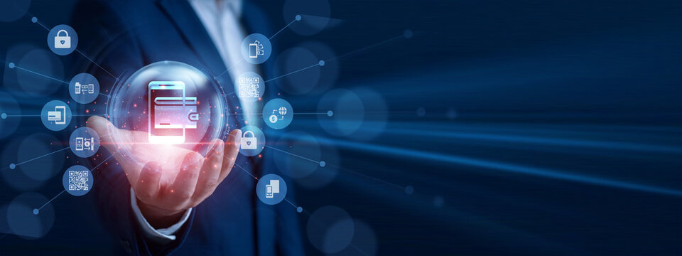 Fintech specialist holding the hand glowing digital wallet icon. Professional analyzing transaction sales data and economic growth graph chart on hologram screen. Cashless payment system.