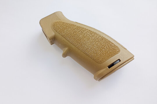 Chisinau, Moldova, July 18, 2026: A tactical grip for AR-15 rifles manufactured by Heckler & Koch (HK), shown against a white background. Close-up of a firearm component.