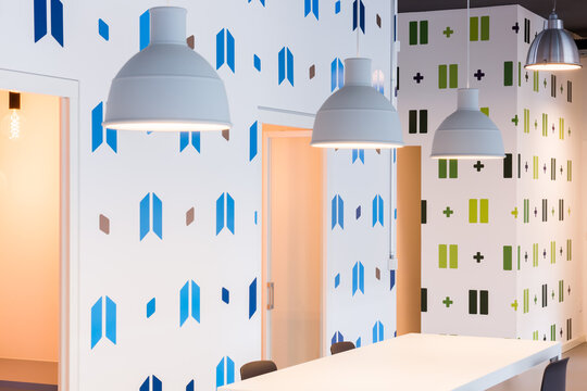 Modern coworking office interior with pendant lamp decor