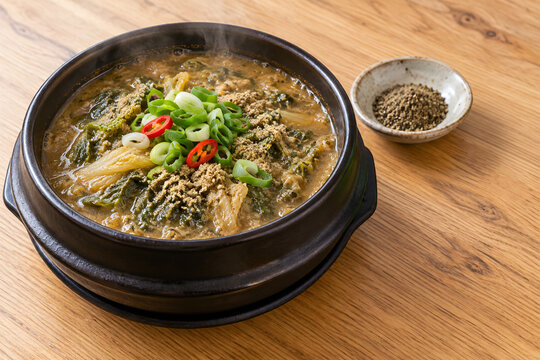 Korean chueotang loach soup in earthenware pot with perilla powder