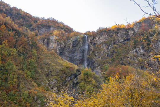 Polikarya waterfall in autumn, Krasnaya Polyana, Sochi, Russia