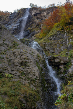 Polikarya waterfall in autumn, Krasnaya Polyana, Sochi, Russia