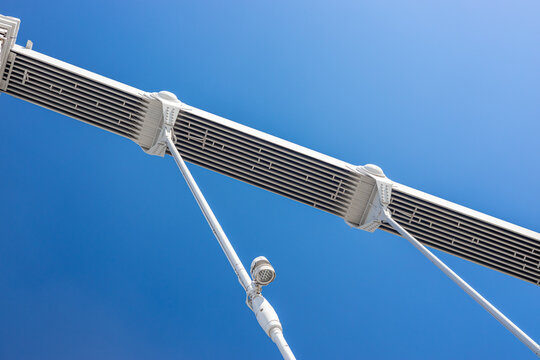 White metal structure against clear blue sky