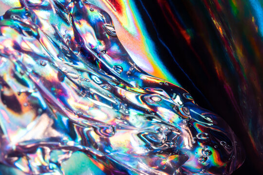 Iridescent liquid texture with abstract science background