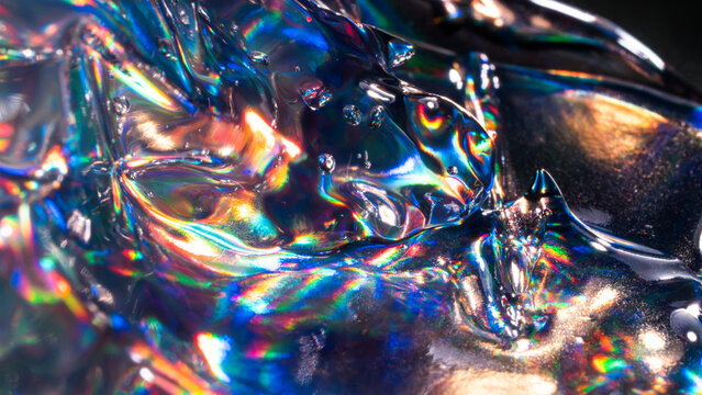 Iridescent liquid texture with rainbow light reflections