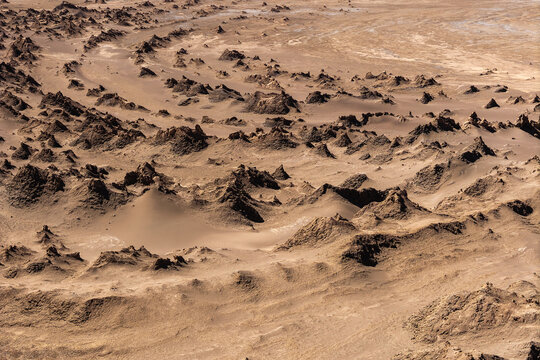 Eroded rock formations and sand textures in Atacama Desert