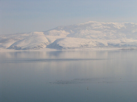 lake and mountains in winter