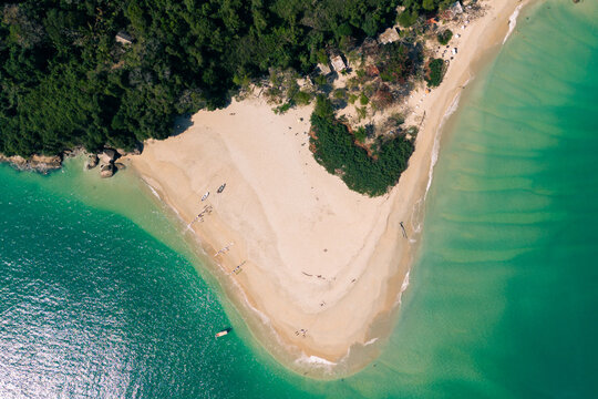 Aerial view of sandy beach and turquoise sea in Ubatuba