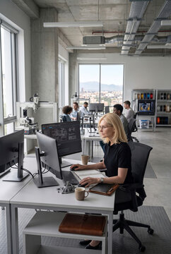 Woman engineer use CAD software in industrial design office