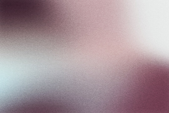 Abstract background blending colorful gradients with subtle grainy texture and soft blur