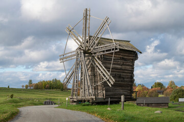 Obraz premium Od wooden windmill on a September afternoon. Karelia