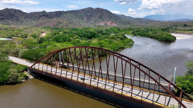 El Quimbo Hydroelectric Dam and Reservoir on the Magdalena River in Huila, Colombia. Establishing Shot. Aerial View.