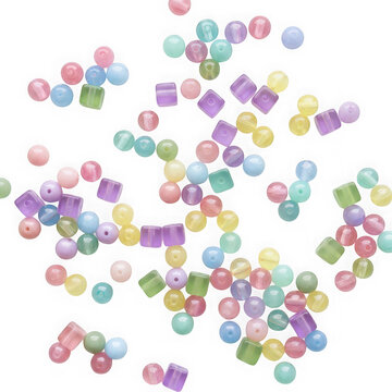 Assorted colorful translucent plastic beads scattered on a transparent background