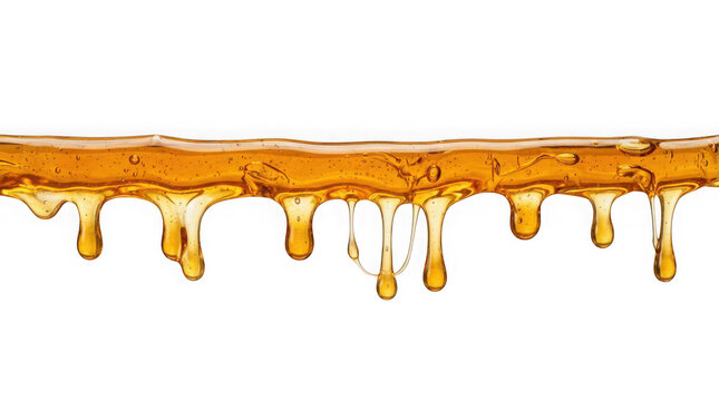 Thick golden honey dripping down isolated on transparent background