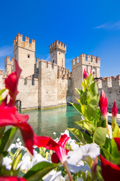 Sirmione Castle on Lake Garda, Italy, historic medieval fortress and picturesque waterfront