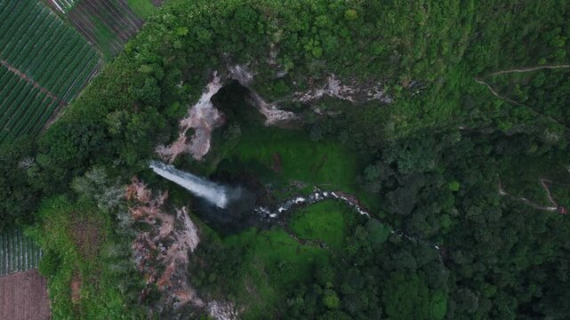 Sipiso Piso Waterfall in North Sumatra, Indonesia &ndash; Cinematic Drone Aerial View of Tropical Waterfall and Lush Mountain Landscape