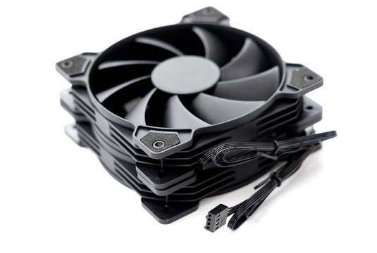 A stack of black computer case fans on a white background