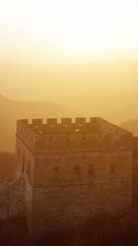 Flying over the Great Wall of China at sunrise. Vertical Video,