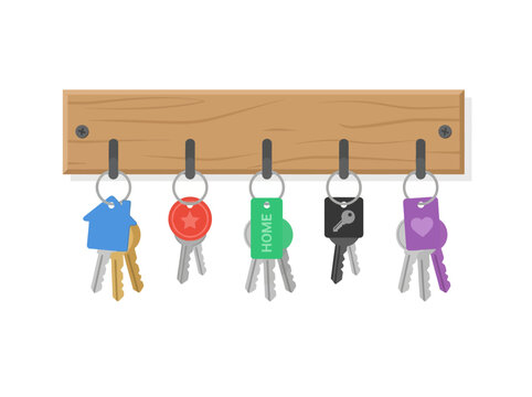 Wooden hook rack with house keys and colored tags