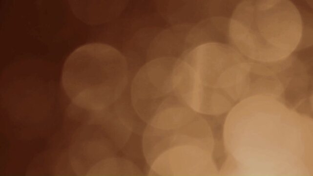 abstract golden elegant bokeh orb pattern dynamic video background or backdrop for creative projects
