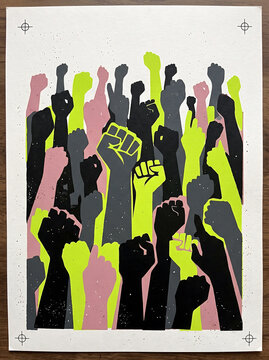 Screen print poster featuring a crowd of raised fists in black, neon yellow, and pale pink, with registration marks in the corners and a textured, distressed ink effect on a white background