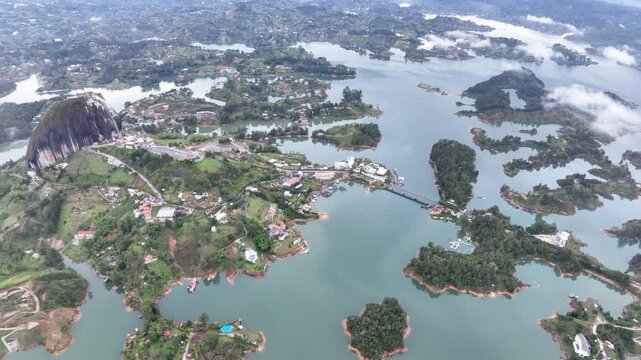 Scenic Guatap&eacute; Lake and Green Islands Surrounded by Mountains in Antioquia, Colombia. Establishing Shot. Aerial View.