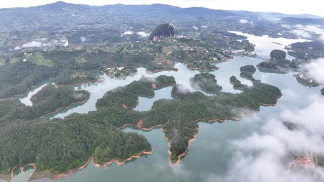 Scenic Guatap&eacute; Lake and Green Islands Surrounded by Mountains in Antioquia, Colombia. Establishing Shot. Aerial View.