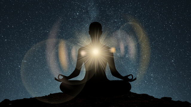 Meditative silhouette with radiant energy image