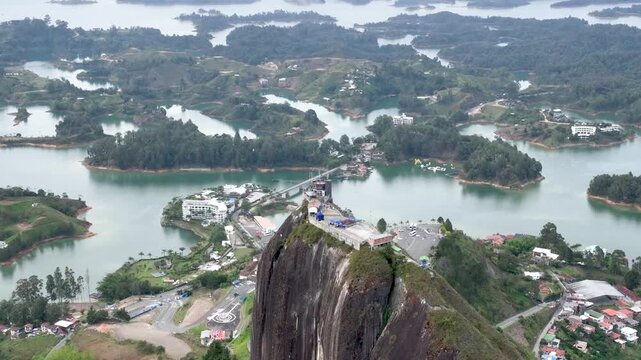 Guatap&eacute; Tourism Landscape with Piedra del Pe&ntilde;ol, Reservoir and Scenic Islands in Antioquia, Colombia. Establishing Shot. Aerial View.