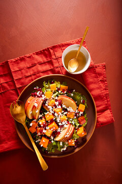 Autumn Squash and Apple Salad Served with Dressing
