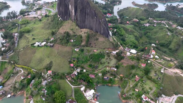 Guatap&eacute; Tourism Landscape with Piedra del Pe&ntilde;ol, Reservoir and Scenic Islands in Antioquia, Colombia. Establishing Shot. Aerial View.