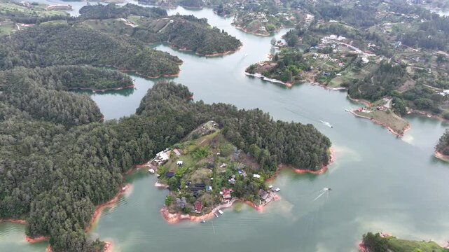 Guatap&eacute; Tourism Landscape with Piedra del Pe&ntilde;ol, Reservoir and Scenic Islands in Antioquia, Colombia. Establishing Shot. Aerial View.