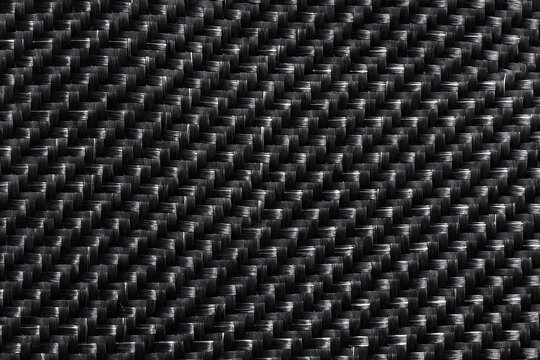 Dark carbon fiber plain weave texture background