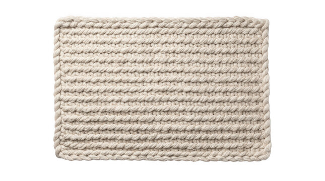 Textured knitted fabric swatch with raised rope border on a bright studio surface