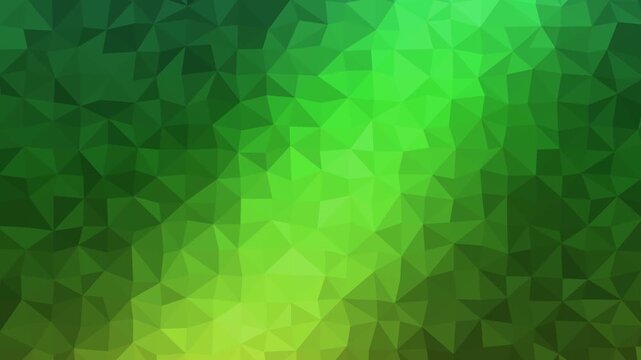 Abstract geometric background featuring a vibrant pattern of triangular shapes in various shades of refreshing lime and deep forest green