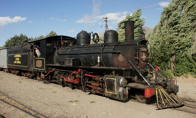 La Trochita, Argentina's historic narrow gauge steam locomotive, stands on railway tracks in El Maitén, Patagonia, showcasing vintage engineering and railway heritage. © Patagonia pics