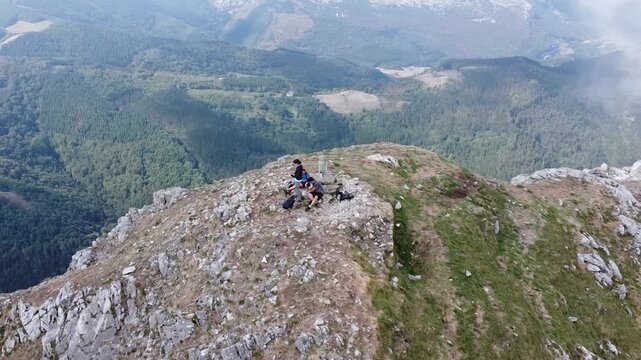 aerial view of hikers in the mountains of the Basque Country