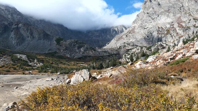 Autumn Foliage and Moving Clouds at Lake Isabelle in Colorado Rocky Mountains