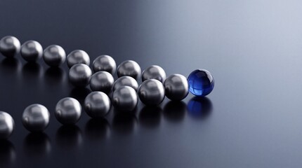 Fototapeta premium Conceptual 3D Illustration of a Unique Blue Glass Sphere Leading a Group of Silver Metallic Balls in a Precise Formation, Symbolizing Leadership, Strategic Direction, and Innovation in Business.