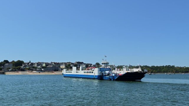 Torpoint Cornwall England UK. 21.08.2026.  Video, Sailing boat approaching a roro Torpoint ferry heading to Devonport across the River Tamar Plymouth UK