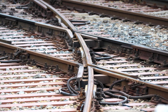 Train track switch point creating multiple railway directions