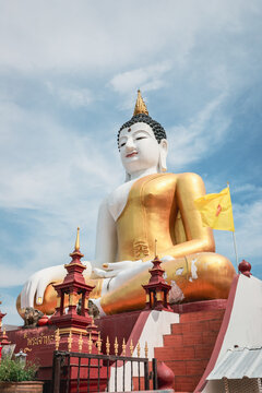Architecture of a red Buddhist temple in Chiang Mai Old City, Thailand