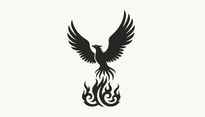 Obraz premium Majestic black silhouette of a rising phoenix bird emerging from fire flames, isolated on a light background.