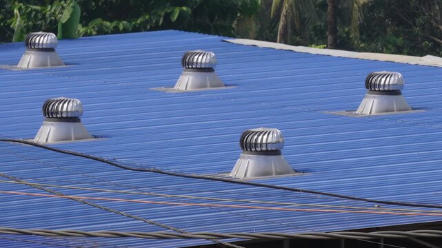 Blue metal roof with turbo ventilators
