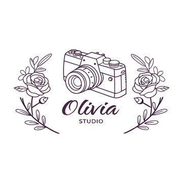 Olivia studio photography logo with center camera and symmetrical rose floral wreaths illustration.